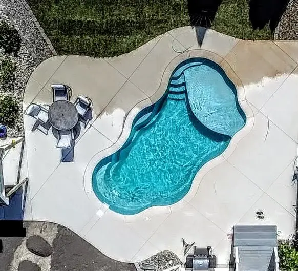 Fiberglass swimming pool installation by Atlantic Fiberglass Pools in Delaware